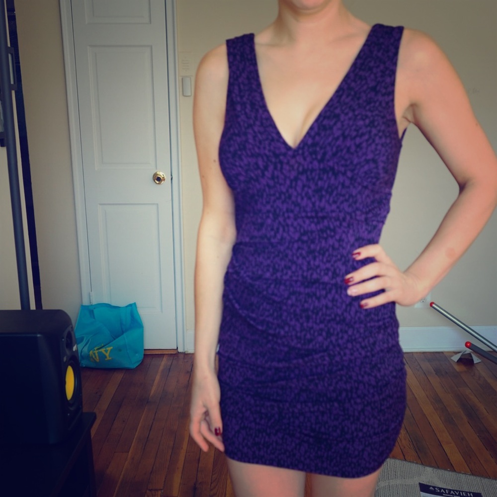 A cute, short, purple and black BCBG dress